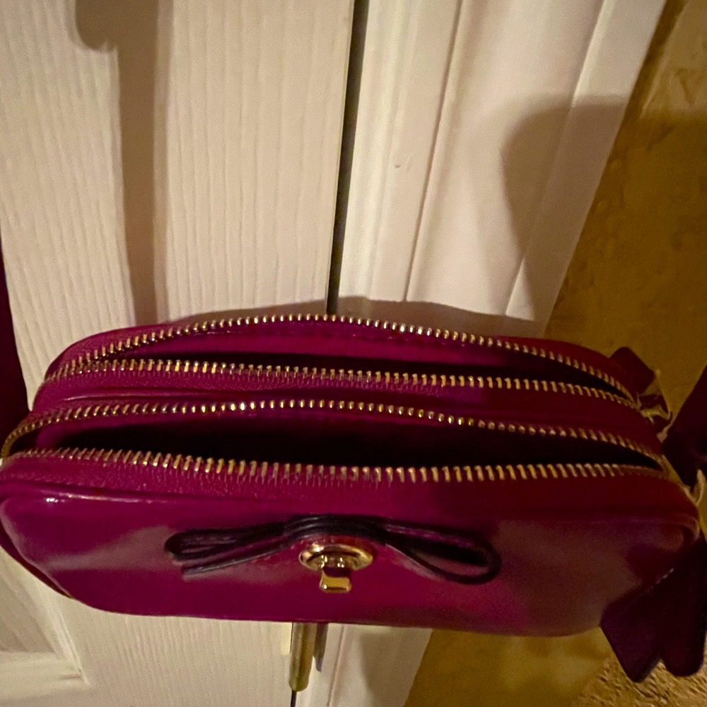 Fuchsia coach mini crossbody